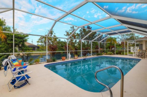 NEW LISTING! Electric-Heated Pool Home on Canal - Villa Dolly
